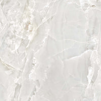 Casalgrande Padana Alabastri White, texture effetto marmo, superficie lucida e semilucida